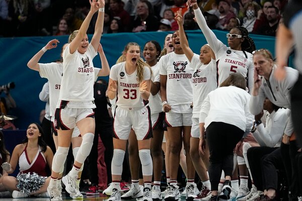 The Stanford bench reacts during the second half.